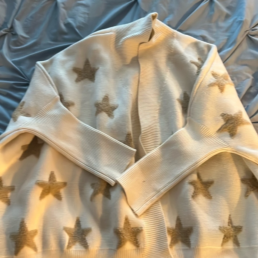 Cream sweater with tan wool stars
